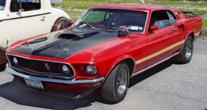 1969-Ford-Mustang-Mach-1-Front-Angle-Maroon-sy The day I buy a '69 Ford Mustang will be more exciting than the day I buy my first pair of full priced Manolo Blahniks.