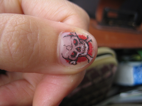 This was one of my nail tattoos, but I had a second one that was much